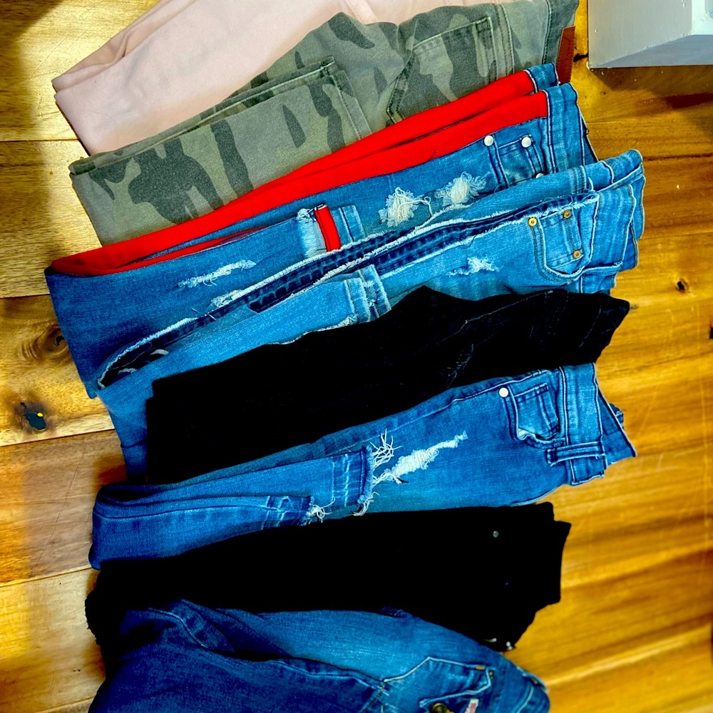 8 pair of girl jeans